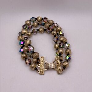 Vintage three strand AB/gold-tone bead bracelet